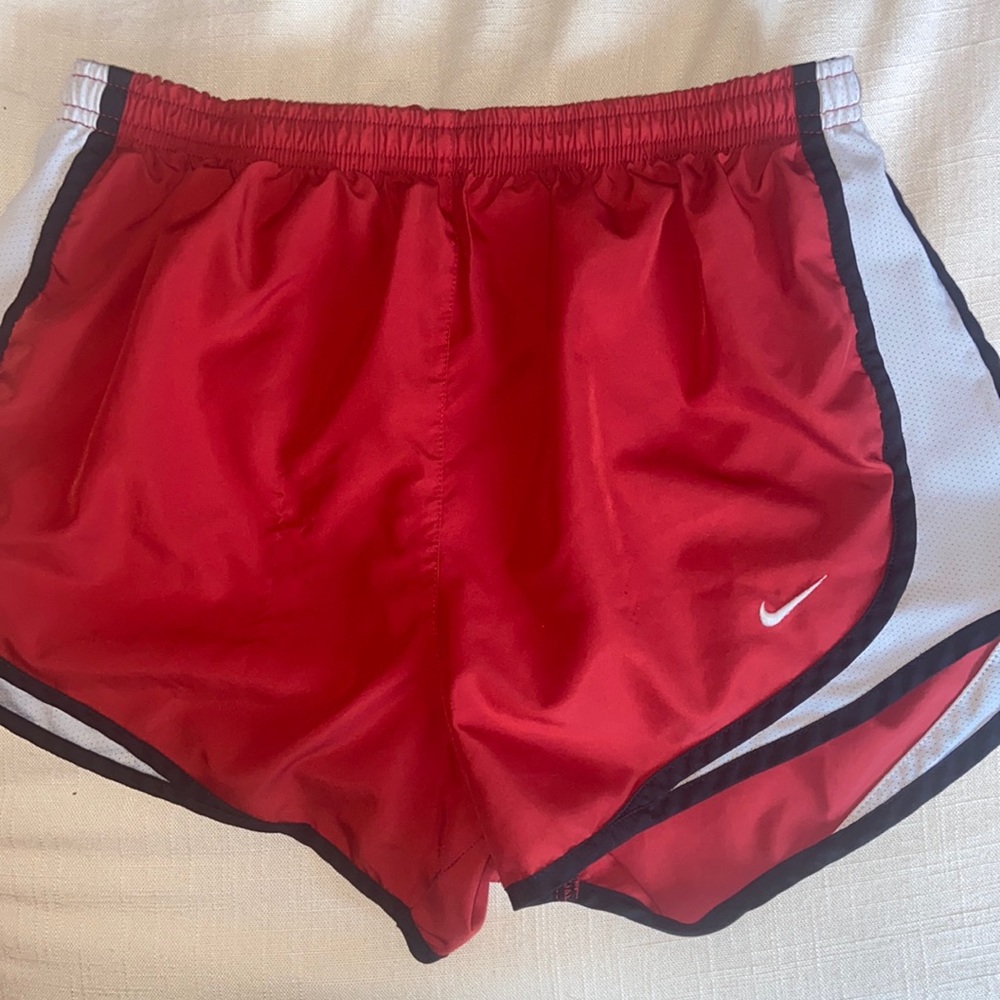 Red Nike women’s running shorts size S